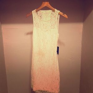 White lace, open back dress